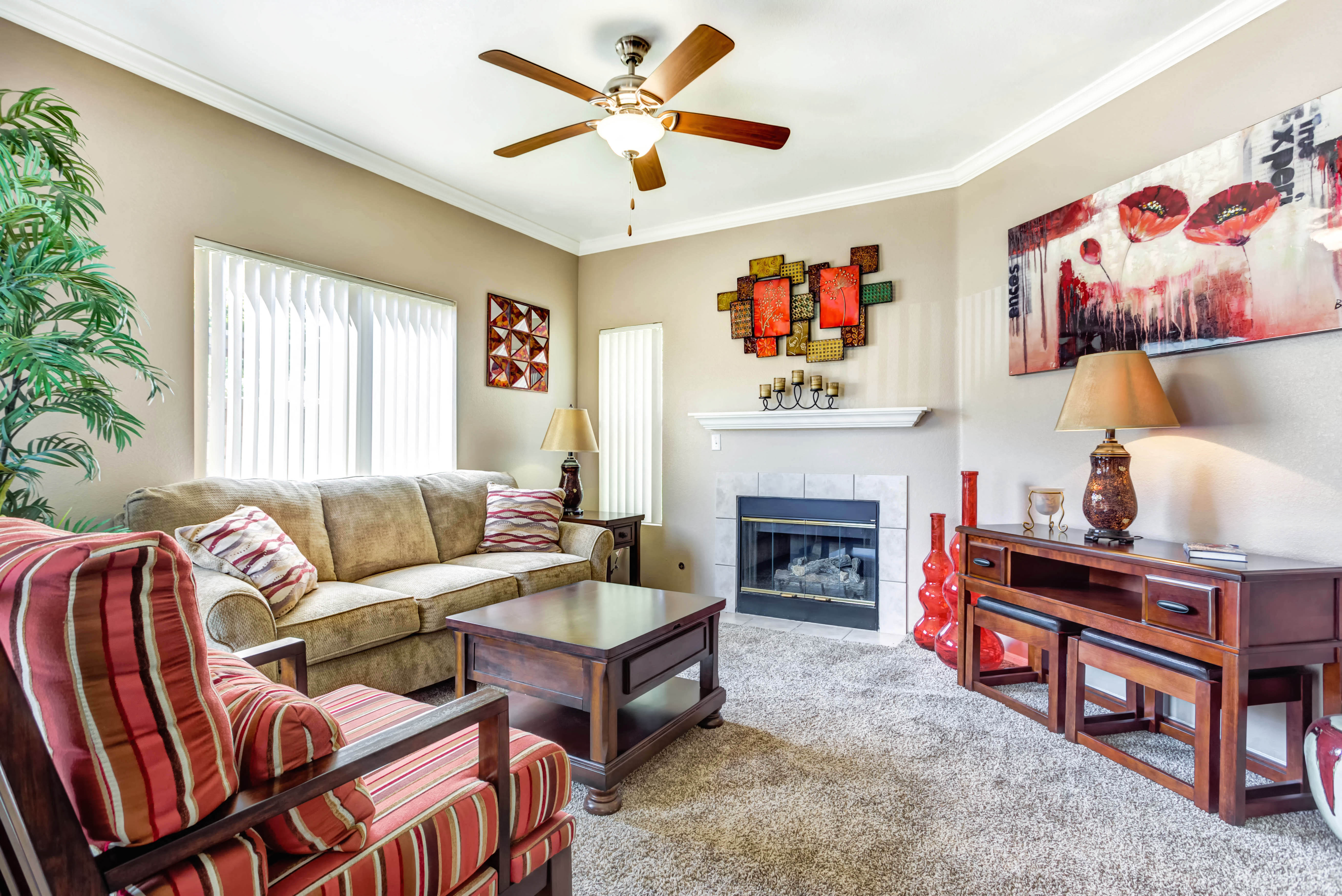 a living room with a couch and a fire place